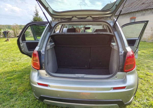 Suzuki SX4 cena 34500 przebieg: 135140, rok produkcji 2013 z Szczecinek małe 211
